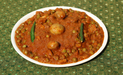 Mushroom and Pea curry in thick tomato gravy