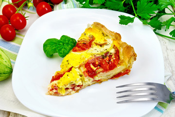 Flan with tomato and zucchini on board