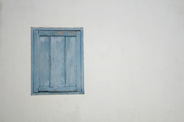 Obraz na płótnie Canvas wood window on cement wall