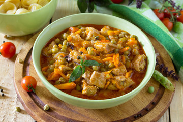 Traditional hot ragout with meat and vegetables stewed in tomato