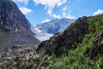 Fototapeta premium Looking a canyon to the top of Folgefonna glacier in Norway