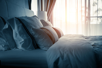 Bed maid-up with clean white pillows