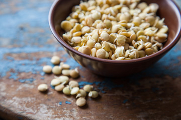 germinated seeds of lentil in a bowl on a table, selective focus