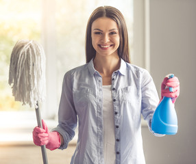 Woman cleaning her house