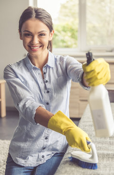 Woman cleaning her house