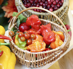 Wicker basket filled with fresh fruit and vegetables