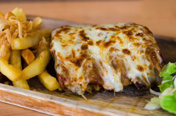 Steak and cheese with Potato and salad