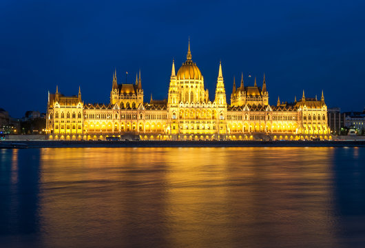 Parliament building and the Danube river at night, Budapest, Hun