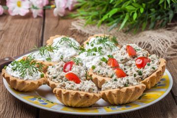 Muffins with smoked salmon pate, cheese and dill.