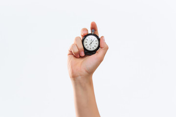 hand holding a stopwatch against a white background