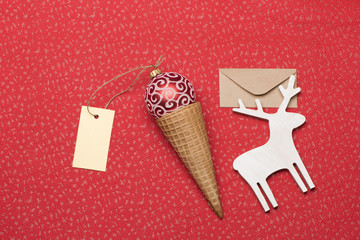 Christmas or New Year decoration on red textured background.