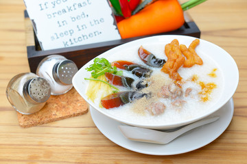 Congee with preserved eggs , boiled rice soup
