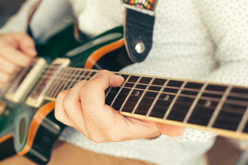 man playing electric guitar © fotofabrika