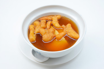 Bean junket eaten hot with gingered syrup, Soy custard
