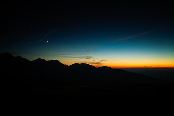 A beautiful moon above the mountains