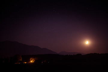 A beautiful moon above the mountains