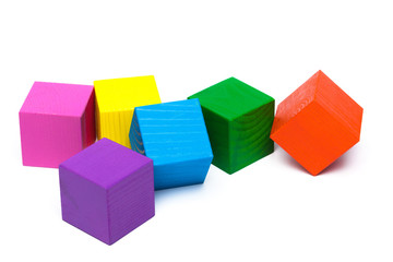 Obraz premium colored children cubes on white isolated background