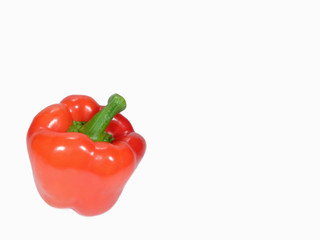 Bright red ripe bell pepper with green stem isolated on white background