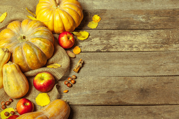 pumpkins on wooden board