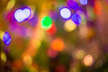 Obraz premium Defocused background decorated Christmas tree. The idea for postcards. Soft focus. Shallow DOF