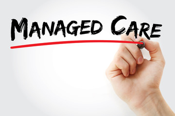 Hand writing Managed care with marker, concept background