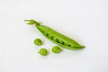 Fresh peas isolated on white background