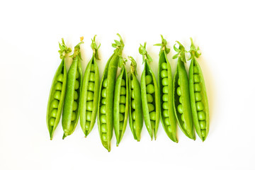 Fresh peas isolated on white background