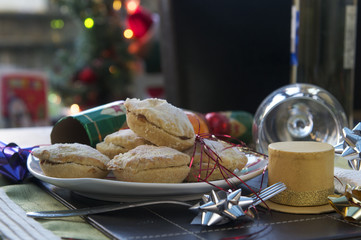 mince pies being eaten on plate at christmas