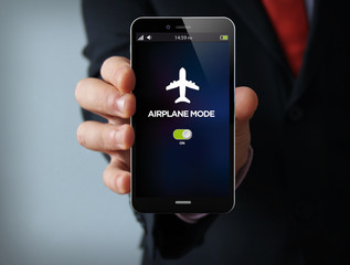 airplane mode businessman smartphone