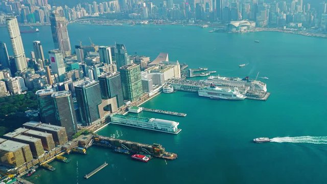 Hong Kong aerial view with urban skyscrapers boat and sea, timelapse, 4k
