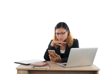  Business woman serious with smartphone while working with her l