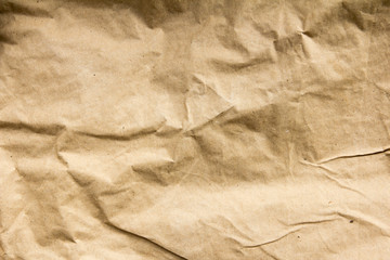 Old brown crumpled paper texture background