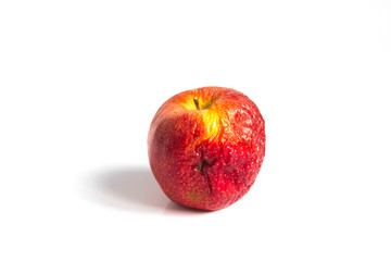 Wizen apple presented as old aging skin