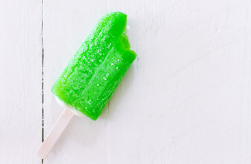 Bite Ice cream lemon on wooden background