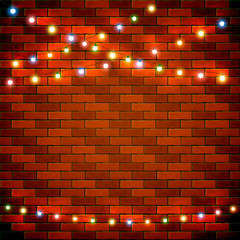 Brick wall background with colorful Christmas lights