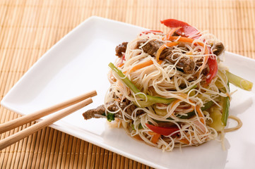Asian salad with rice noodles, beef and vegetables.