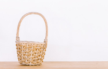 Fototapeta na wymiar Empty basket on wooden table