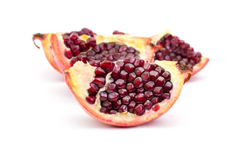 Ripe pomegranate fruit isolated on white background cutout