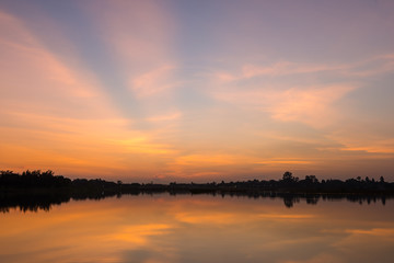 Naklejka na ściany i meble sunset on the lake landscape