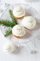 Fototapeta na wymiar Christmas cupcakes with cream cheese