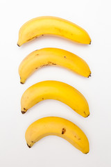 ripe and fresh bananas on white backgrounds
