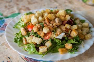 salad with crackers and fresh vegetables