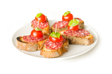 Crostini with salami, tomato and basil, Italian Appetizers