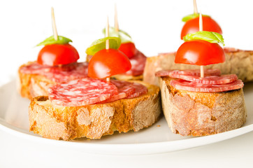 Crostini with salami, tomato and basil, Italian Appetizers