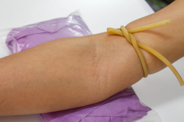 Doctor taking  blood sample