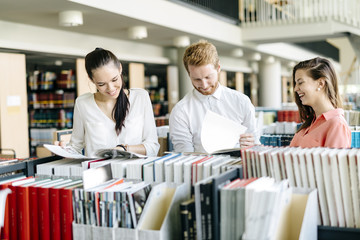 Group of students studying in library
