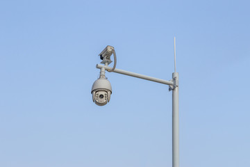 Security camera or cctv on blue sky background