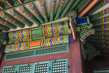 Fototapeta premium Detail of Traditional Korean Roof, Colourful Decorated Ornament