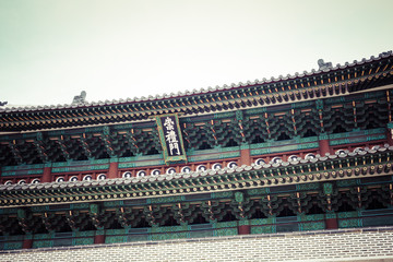 Fototapeta na wymiar Detail of Traditional Korean Roof, Colourful Decorated Ornament