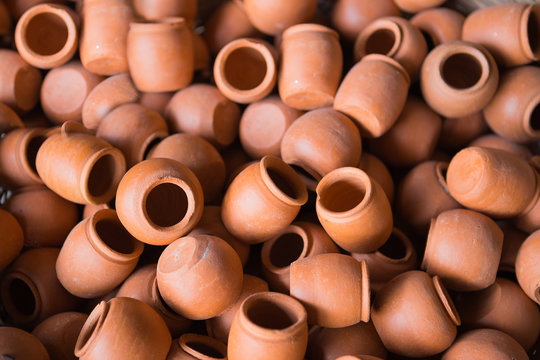 Rustic handmade ceramic clay brown terracotta cups souvenirs at